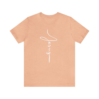 Jesus Cross Christian T-Shirt - Cursive White Font Neutral Color Tees Heather Peach flatlay